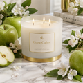Cora Cabre 3-Wick Candle – Green Apple, branded luxury candle jar on marble